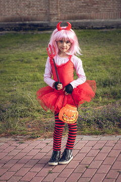 Girl Dressed as a Little Devil for Halloween