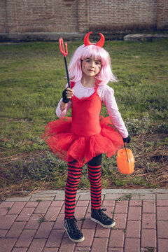 Girl Dressed as a Little Devil for Halloween