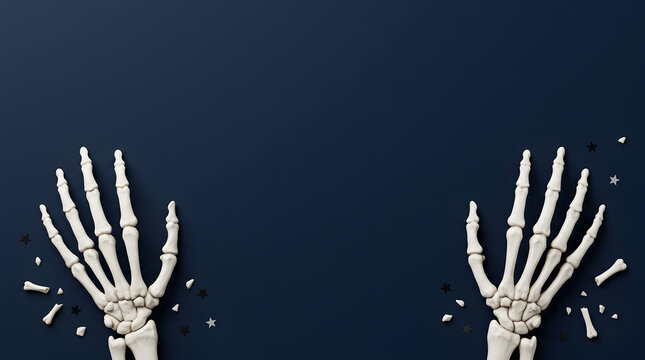 Two human skeleton hands reaching up from the bottom on a dark black background for a spooky and festive halloween holiday design