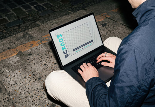 Person Using Laptop on Street Pavement Hard Flash Screen Mockup