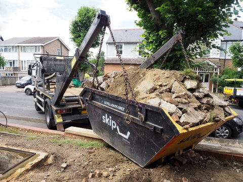 Europe, UK, England, London, skip construction daylight