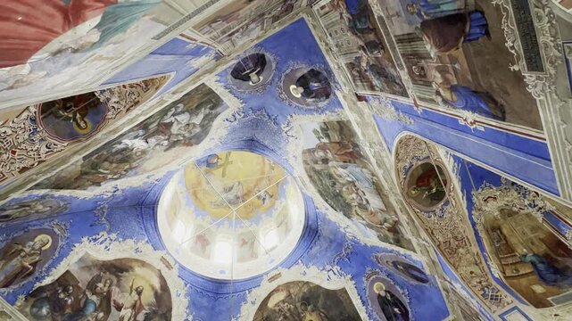 UGLICH, RUSSIA &ndash; AUGUST 12, 2026. Traditional Orthodox frescoes inside one of the churches of the Epiphany Convent, featuring intricate religious paintings and vibrant decorative details.