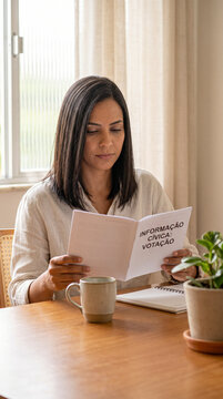 Woman reads voting information leaflet
