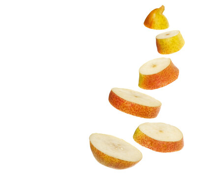 Sliced pear fruits flying isolated on white background, clipping path