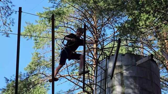 Climbing a water tank in the woods with friends during the morning