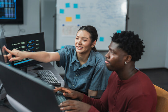 Female and male developers engage in peer discussion exploring AI research concepts and development innovation through collaborative exploration and experimentation.
