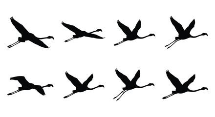 Naklejka premium Black silhouettes of flying cranes depict a dynamic vector illustration