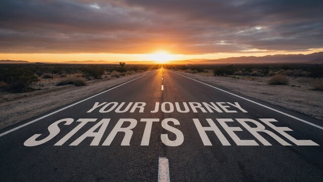 Text Your Journey Starts Here painted on a desert road at sunrise. This represents new beginnings and business opportunity concepts.