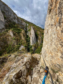 hiker in the mountains, Via Ferrata Sky Fly from Turzii Gorges, Trascau Mountains, Romania 