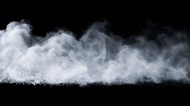 White snow powder explosion on black background. Winter frost dust cloud and frozen particle burst. Christmas blizzard effect overlay. Christmas visuals, or action particle effects.