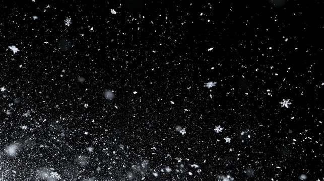 Falling snow and realistic snowflakes overlay isolated on black background. Winter blizzard storm effect for Christmas holiday design