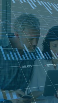 Analyzing financial data on laptop, business people with charts animation over them