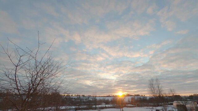 Dark Clouds Passing Through Colorful Sunset Sky Timelapse

