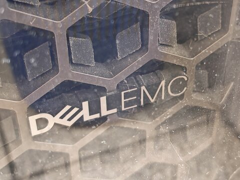 Prague,Czech Republic-15 July 2025:Dell EMC logo visible through dusty protective surface, rear view
