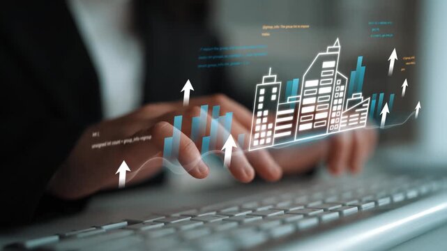 Business Professional Using Computer for Financial Analysis with Graphs and Charts Representing Growth in Urban Development Sector Gluon.