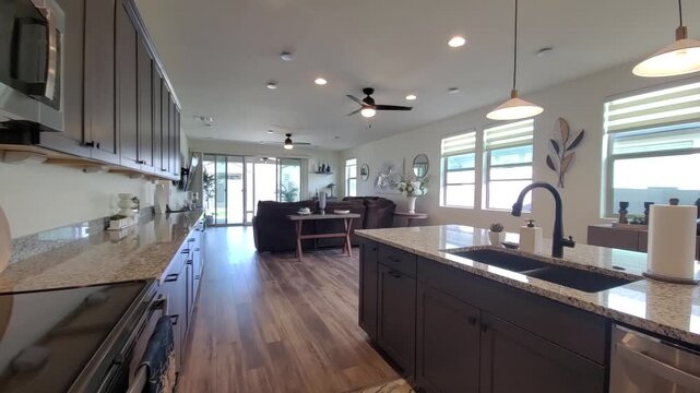 Modern kitchen with island and bright daylight