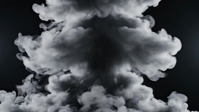 Slow motion dark smoke cloud rising in dramatic black and white
