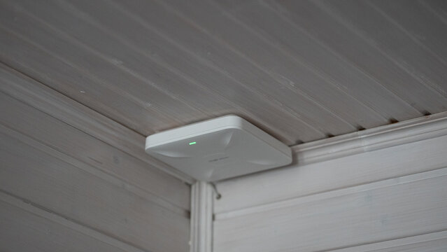 Installation of wireless access point on ceiling in indoor space