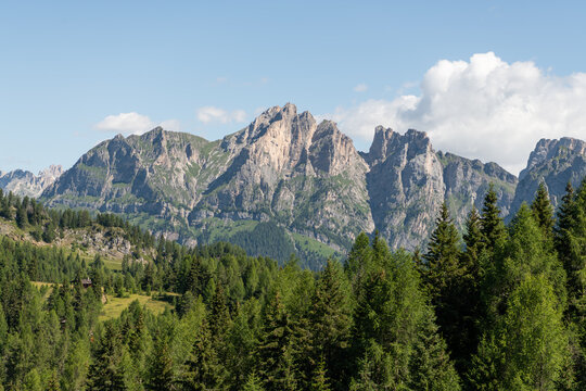 Dolomites, Italy. Dramatic mountain peaks and alpine forest landscape near the trail to Rifugio Sonoro al Coldai