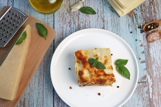 lasagna with basil leaf on plate