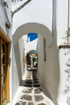 Mykonos island alley with traditional Cycladic architecture