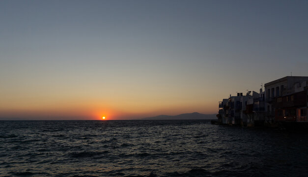 Mykonos Little Venice watching sunset over Aegean Sea