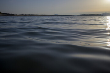 Calm water surface at sunset © MiguelA
