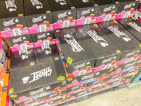 Stacked black boxes of Ghost Energy drinks on display in a warehouse retail store - Federal Way, USA - August 14, 2026