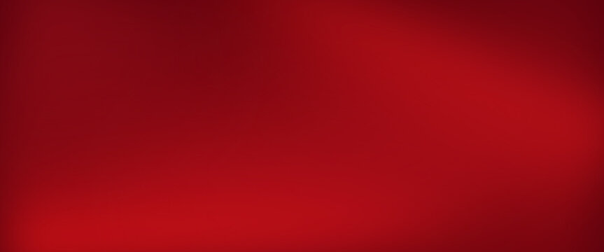 A vibrant and striking abstract gradient background in shades of deep rich and compelling red tones