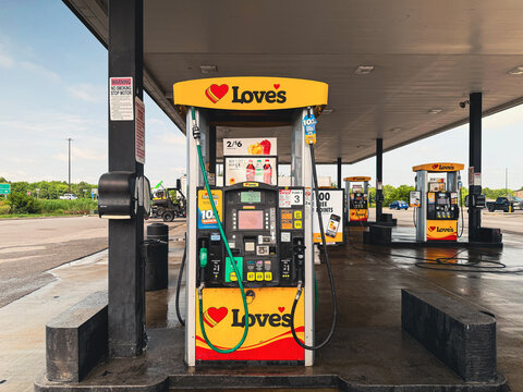 Ina, Illinois, USA - June 9, 2026: Fuel island and pumps under an overhead canopy at a Love's Travel Stop location.