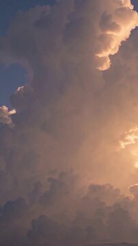 golden thundercloud towering with dramatic light, intense cumulonimbus column illuminated from inside, turbulent textures and radiant edges, storm chaser mood, powerful weather scene