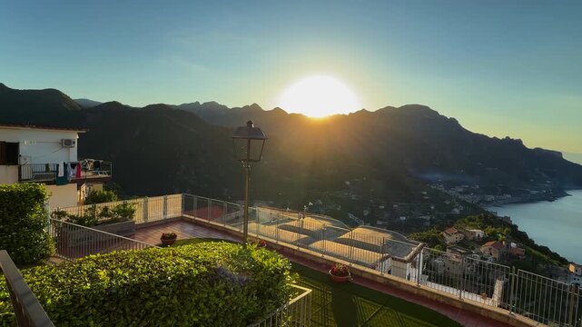 Sunrise Over Coastal Terrace With Sea View, Mountains and Village Below at Golden Hour from Ravello towards Amalfi Coast Italy