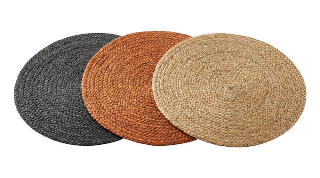 Three round woven placemats in grey, orange, and beige isolated on transparent background