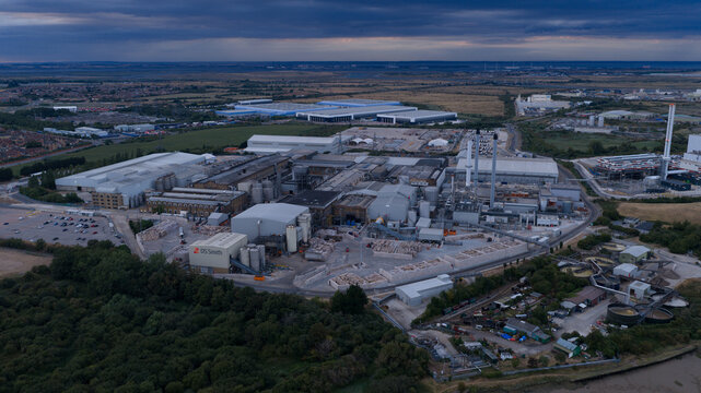 Sittingbourne, United Kingdom - 30 July 2026: Aerial view of DS Smith Kemsley Paper Mill, showing industrial facilities, large warehouses, and surrounding landscape under a cloudy sky.