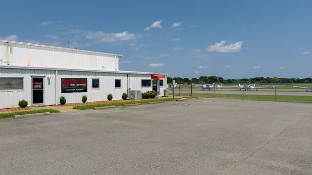 The Austin Peay State University, APSU, Aviation Science Building at Clarksville Regional Airport, also known as Outlaw Field. Private airplanes are on the tarmac.