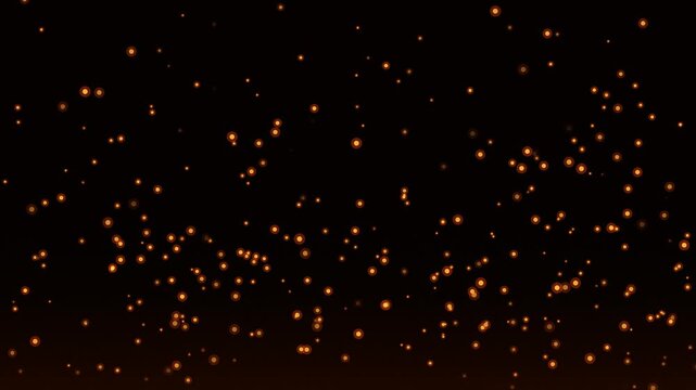 Realistic fire sparks isolated on a black background, capturing vibrant dynamic glowing embers for cinematic visual effects and motion graphic overlays.