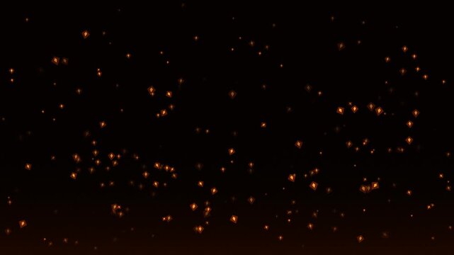 Realistic fire sparks isolated on a black background, capturing hot bright dynamic glowing embers for cinematic visual effects and motion graphic overlays.