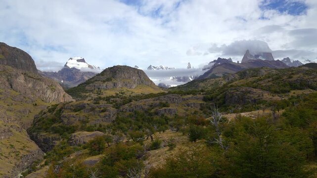 Scenic landscape view of the Andes mountains in Patagonia Argentina with snow capped peaks and clouds