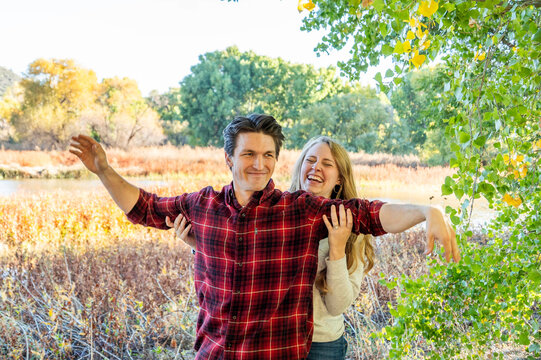 posing outdoors in a field