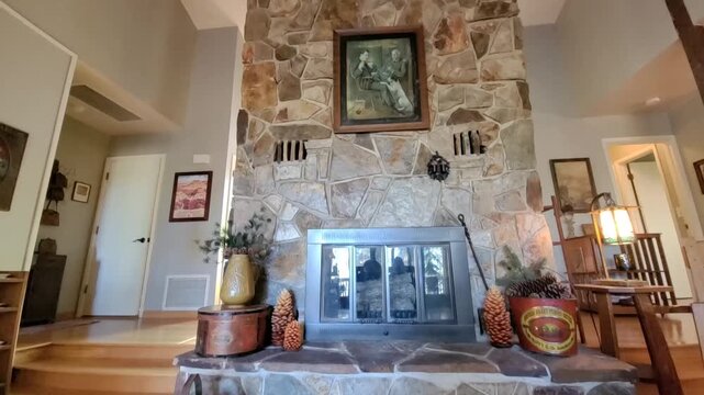 Rustic living room with stone fireplace
