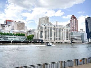 Fototapeta premium New York, NYC June 19, 2026: Weill Cornell Medical Center and New York Presbyterian Hospital Buildings along the East River in Manhattan, New York City with River View 