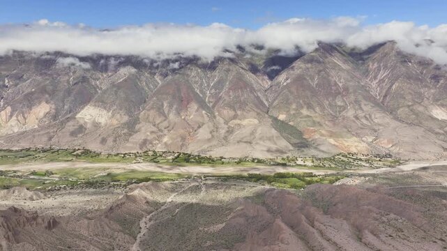 Andean highland valley beneath clouds near Purmamarca