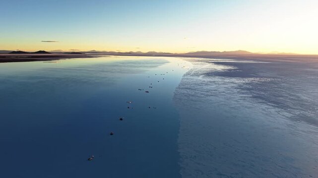 Sunrise over Salar de Uyuni salt flat in Bolivia