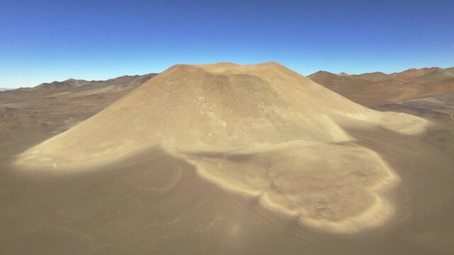 Aerial volcanic cone in La Puna highland desert, Argentina