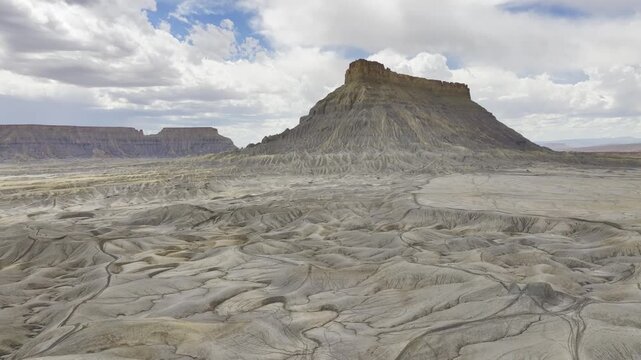 Aerial view of Factory Butte sandstone badlands in Utah
