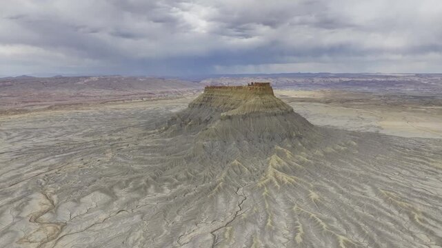 Aerial view of Factory Butte sandstone badlands in Utah