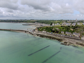 Aerial drone view of underwater oyster farms in Cancale, Brittany, covered during high tide, raditional sustainable aquaculture and production of premium French oysters, France © barmalini