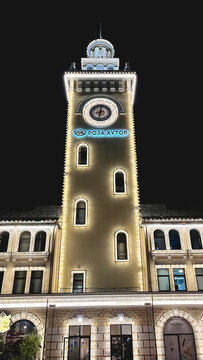 Clock tower at Rosa Khutor resort in Sochi at dusk