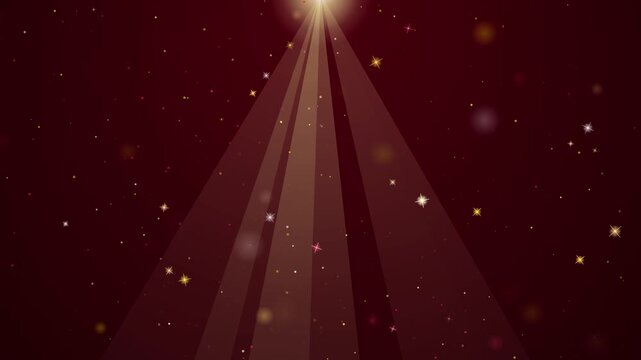 Golden light rays with floating particles on dark red