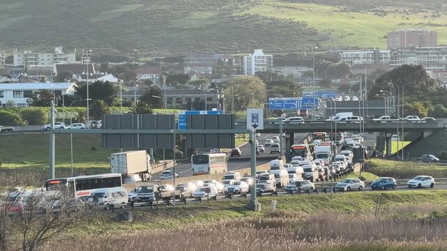 Peak hour in Cape Town on the freeway leaving the City at dusk.